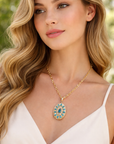 The Temptress Pendant (14k Yellow Gold, Diamonds, and Blue Topaz)
